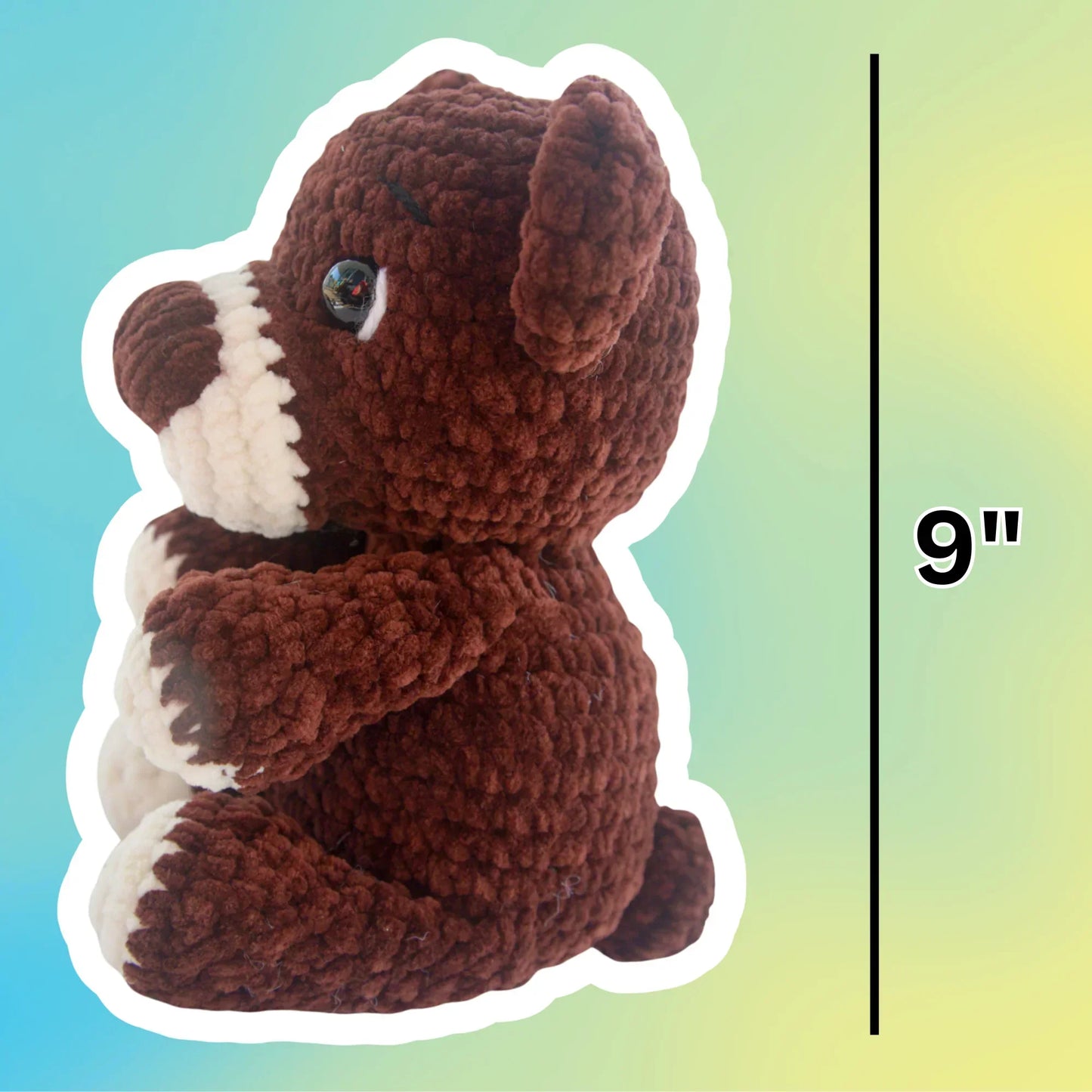 Plush crochet bear stuffed animal, 9 inches tall, with brown and white yarn, side view
