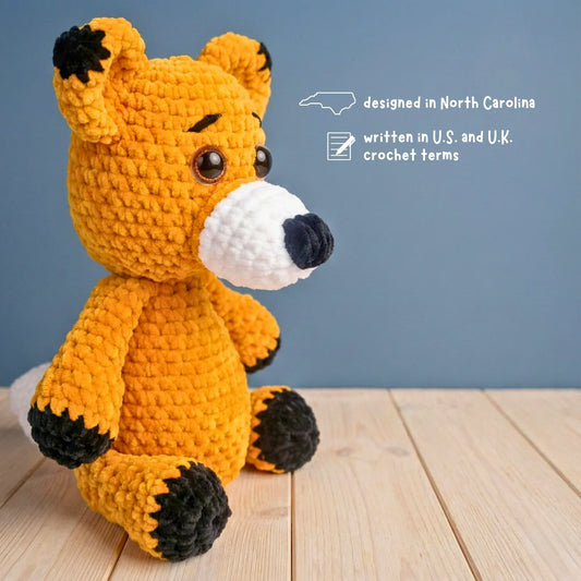 crochet fox stuffed animal amigurumi plushie pattern for beginners on wooden surface