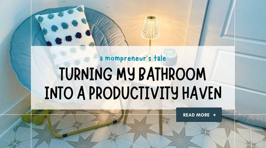 Cozy blue chair with polka dot pillow and small side table with lamp on patterned tile floor