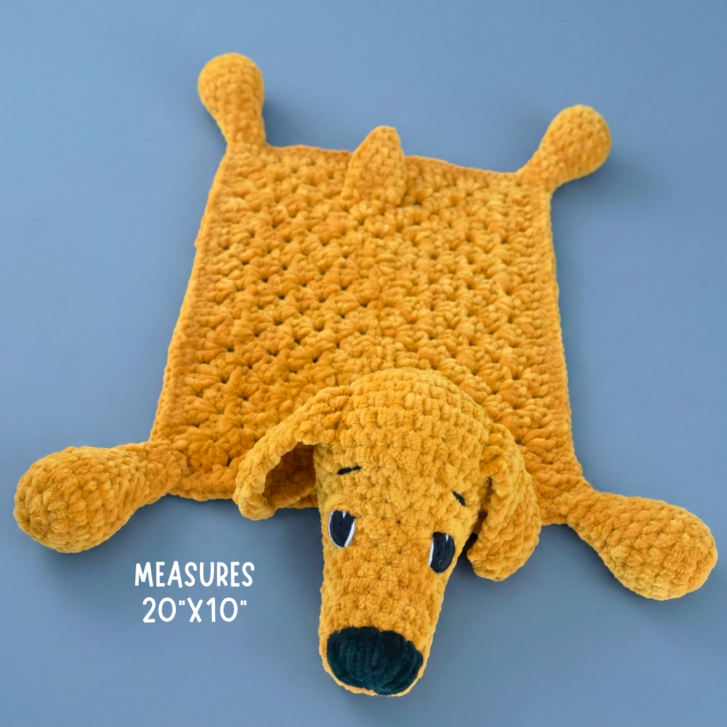 Handmade plush yellow dog rug with embroidered eyes and nose, measuring 20x10 inches