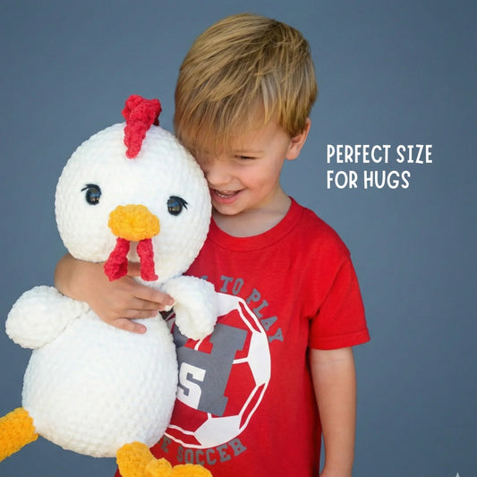 Smiling child in red shirt hugging large crochet chicken plushie, text reads perfect size for hugs.