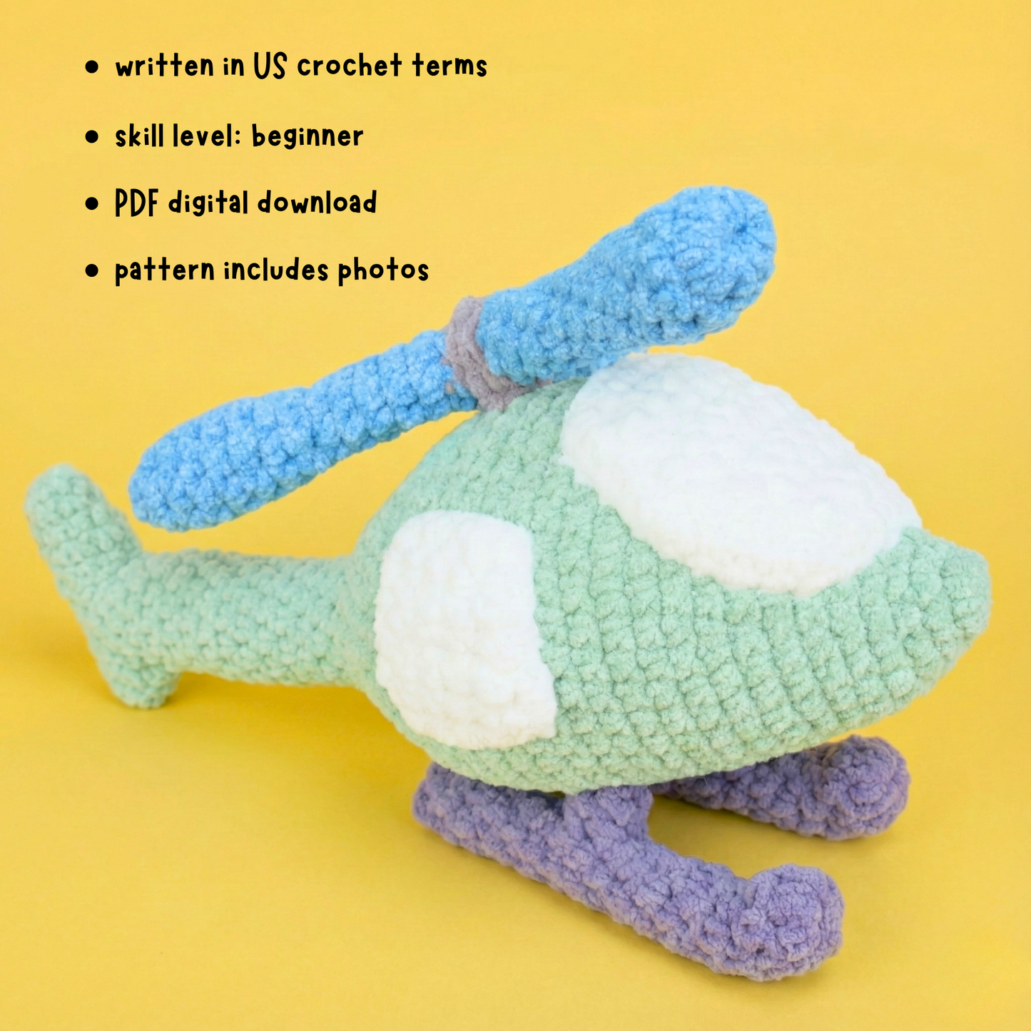 Crocheted green helicopter toy with blue rotor blades and purple landing skids on yellow background