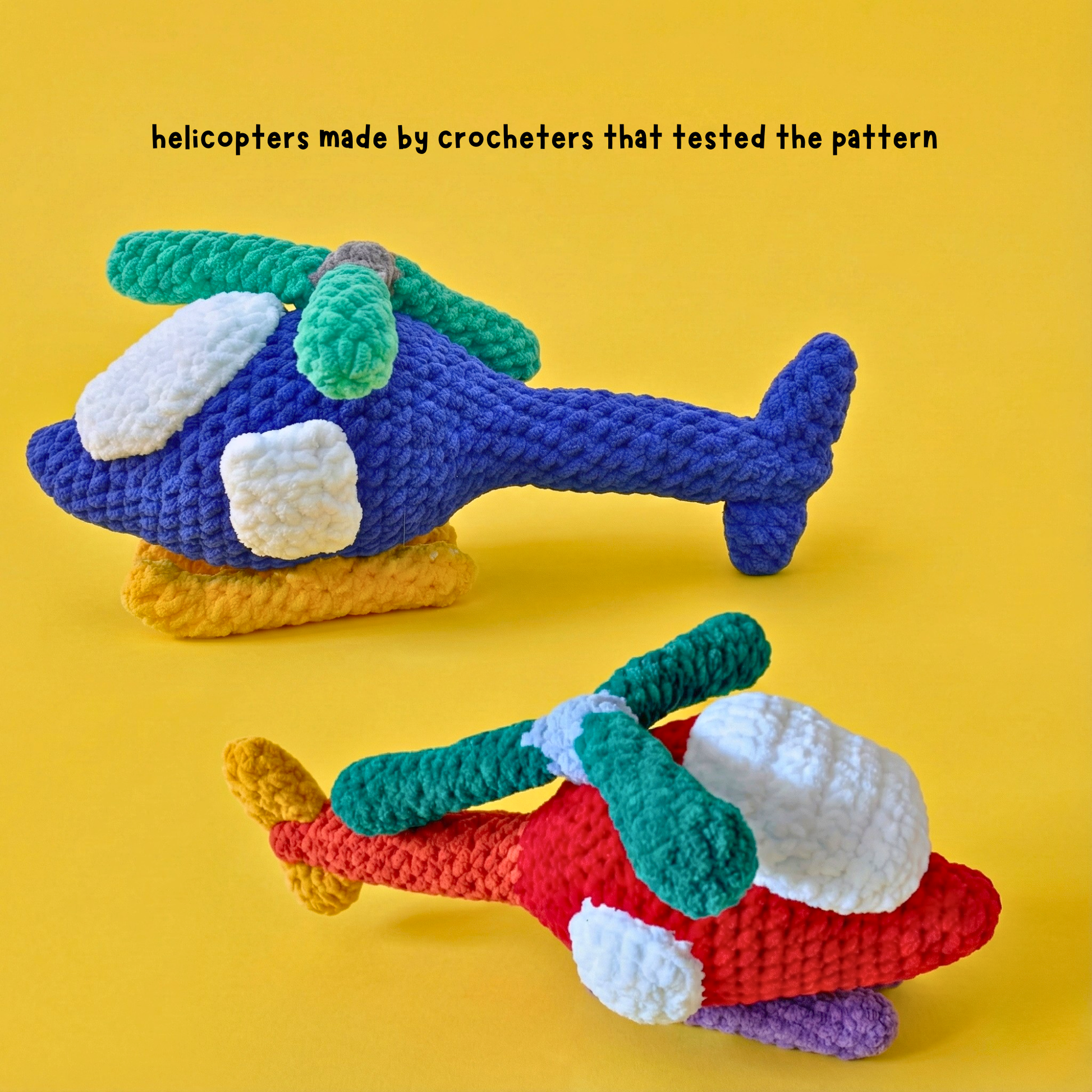 Two colorful crocheted helicopters, one blue with green blades and one red with green blades, on yellow background