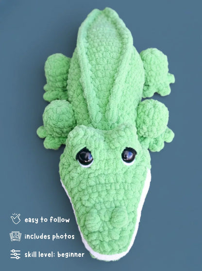 Green crochet alligator plushie, beginner-friendly amigurumi pattern with large eyes.