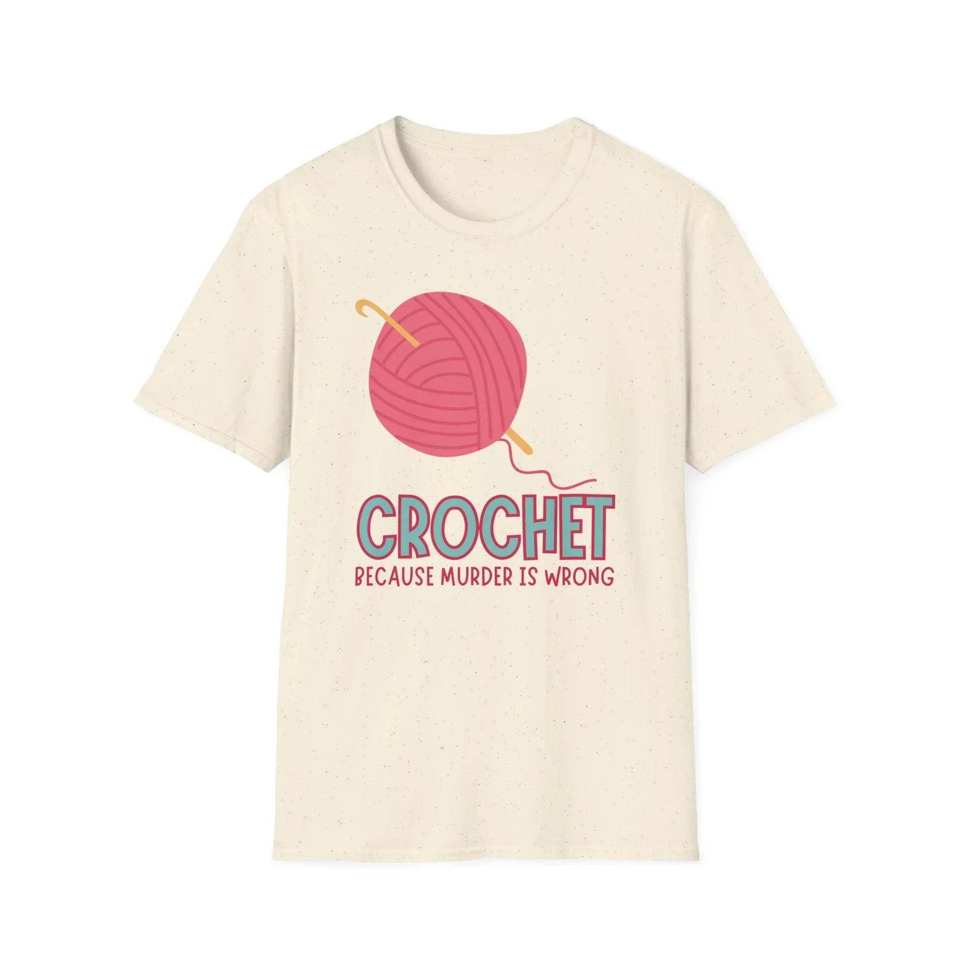 Beige t-shirt with a pink yarn ball and crochet hook graphic and text on a white background