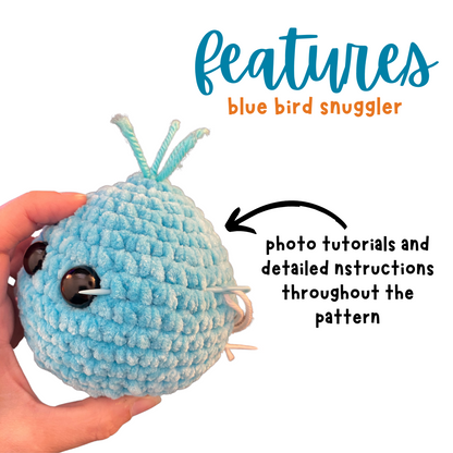 Hand holding a crochet blue bird snuggler amigurumi with safety eyes and text about pattern features
