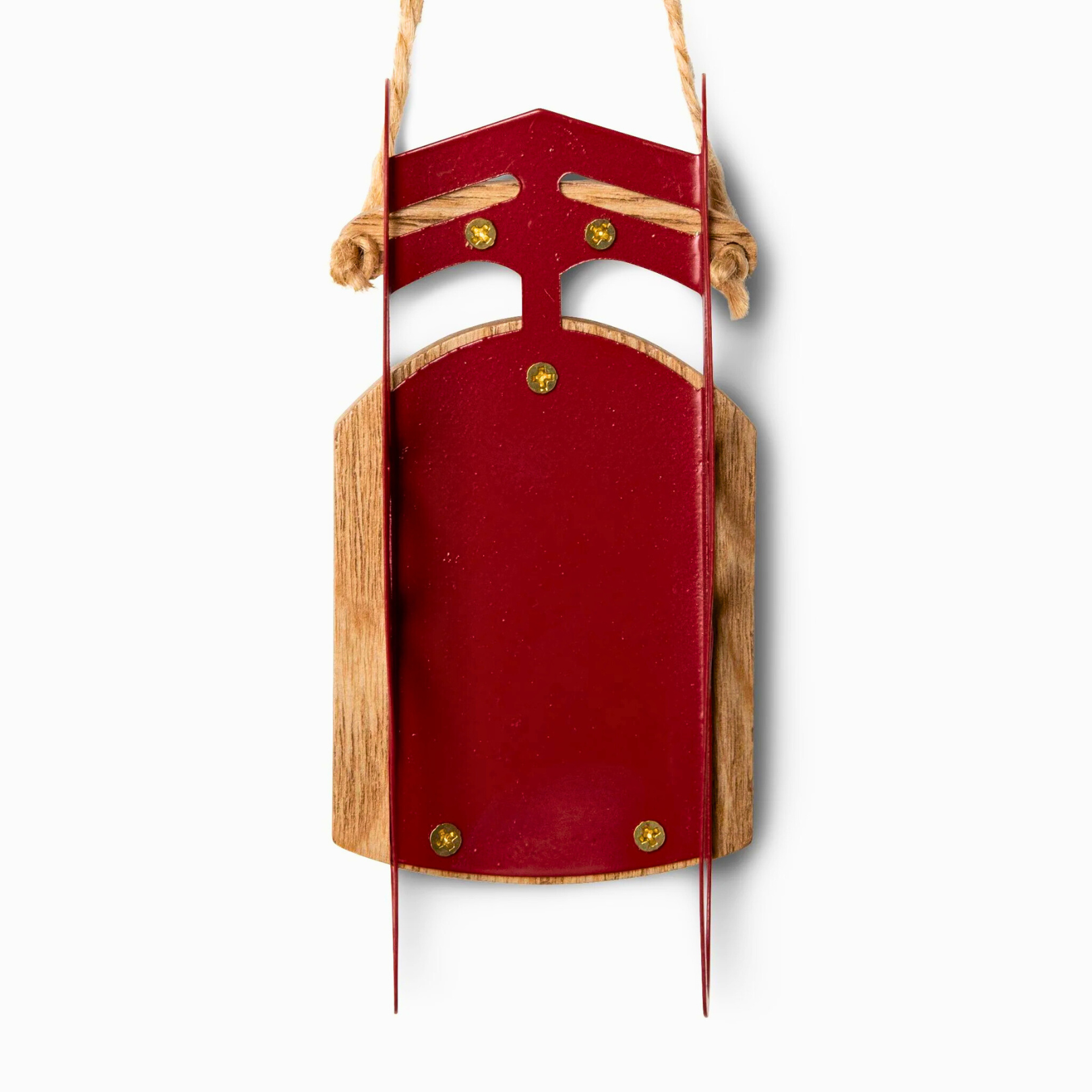 Red wooden sled with a white background