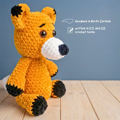 crochet fox stuffed animal amigurumi plushie pattern for beginners on wooden surface