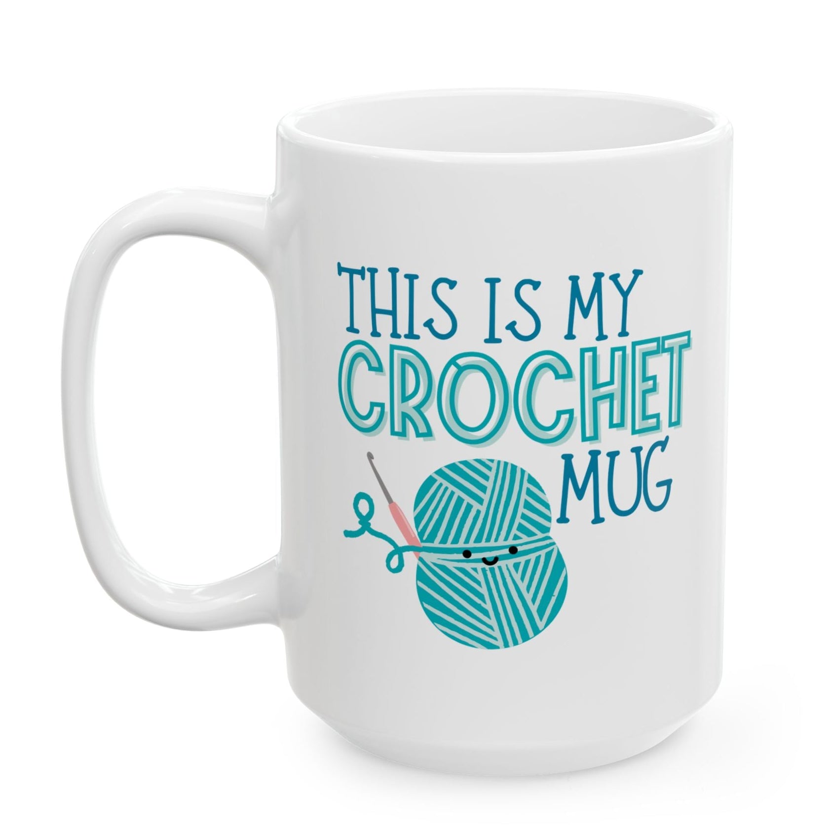 White mug with teal text and yarn ball design on a white background