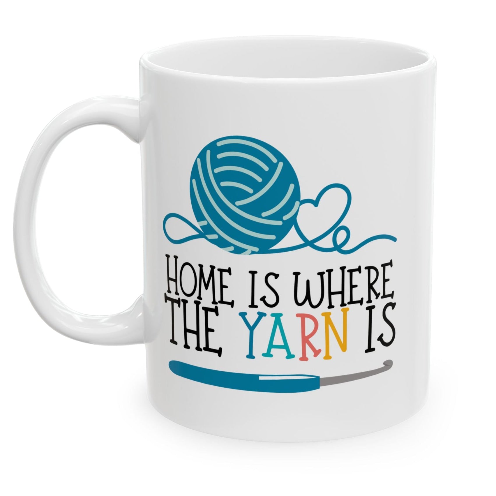 White mug with a blue yarn ball and text design on a white background